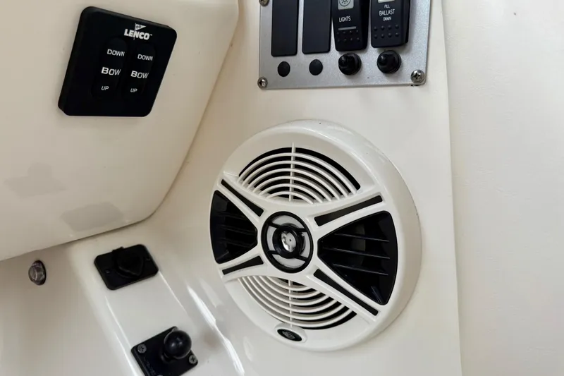 Slide: The Image of 2009 Chaparral Sunesta 224 Xtreme boat interior with speaker and control panel. - 37