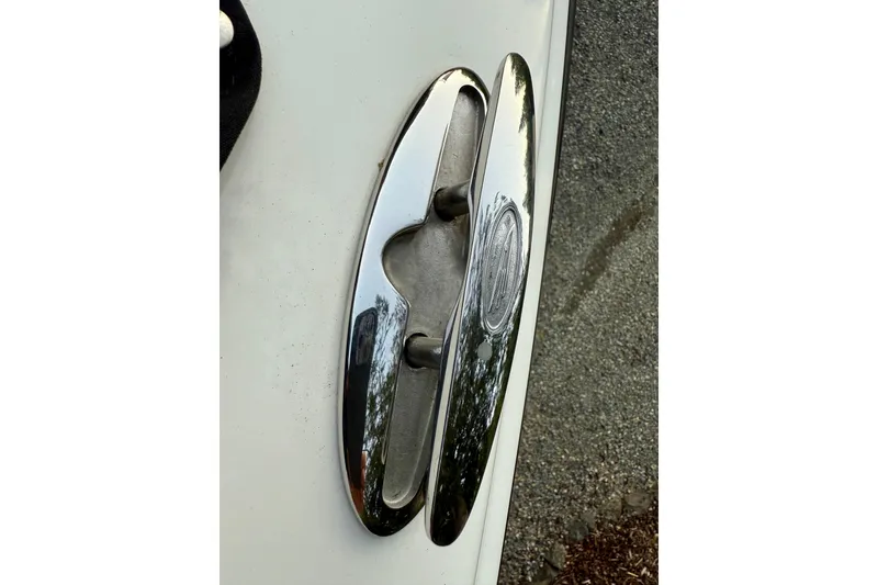 Slide: The Image of Chrome cleat on 2009 Chaparral Sunesta 224 Xtreme boat, close-up view. - 41