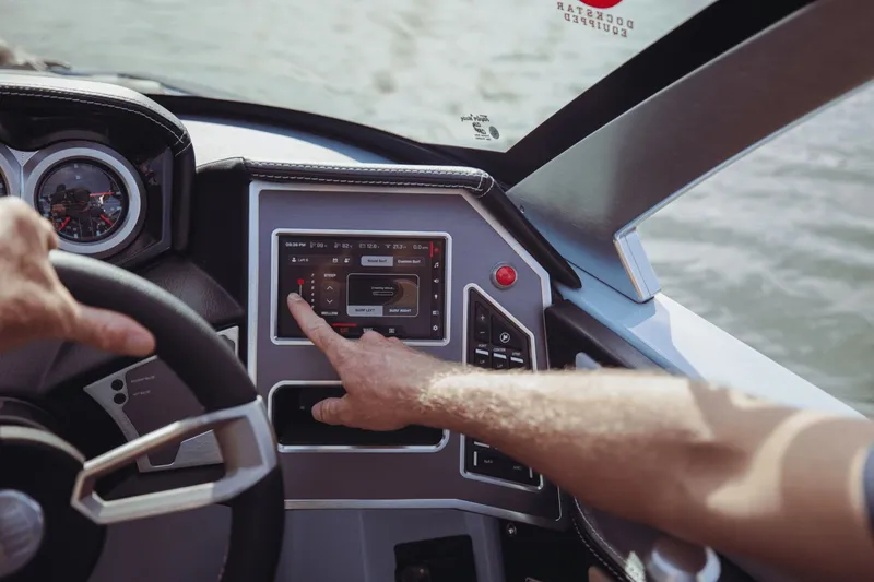 Slide: The Image of Interior of 2026 MasterCraft XT20 with beige leather seating. - 10