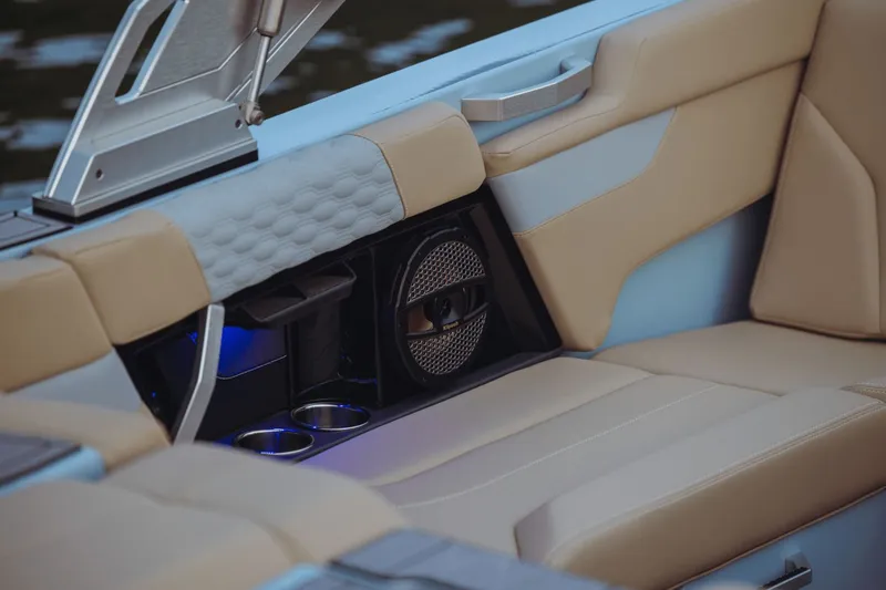 Slide: The Image of Interior of 2026 MasterCraft XT20 with beige and white upholstery. - 11
