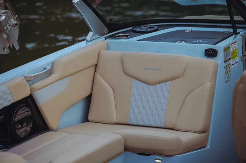 Slide: The Image of Interior of 2026 MasterCraft XT20 with beige upholstery. - 12