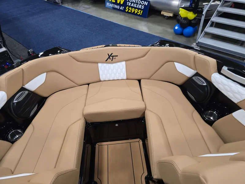 Slide: The Image of Luxurious interior of 2026 MasterCraft XT20 with beige upholstery. - 27