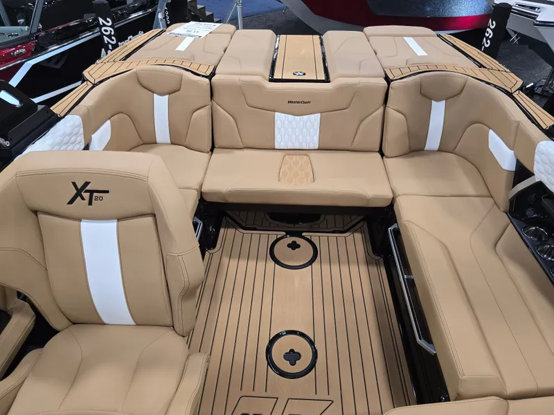 Slide: The Image of Interior of 2026 MasterCraft XT20 with beige upholstery. - 28