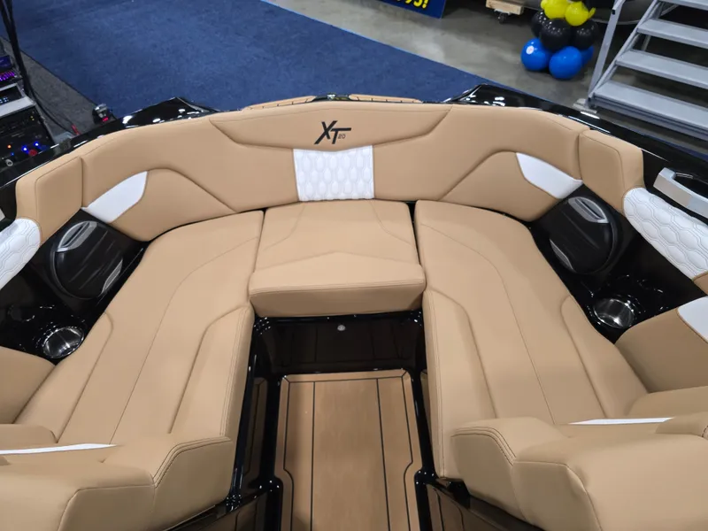Slide: The Image of Interior of 2026 MasterCraft XT20 with beige and white upholstery. - 30