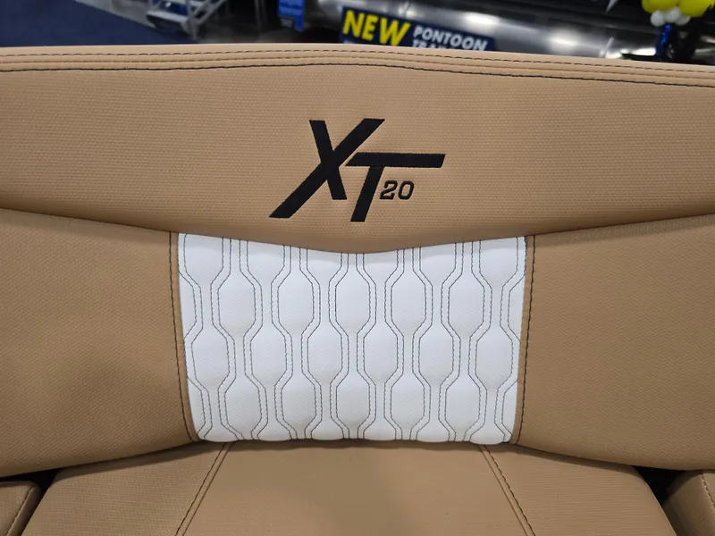 Slide: The Image of MasterCraft XT20 2026 interior with wood accents and blue carpet flooring. - 31