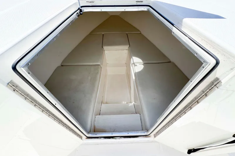Slide: The Image of 2008 Fountain 38 Tournament Edition boat storage compartment, open and empty. - 16