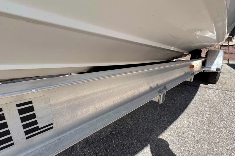 Slide: The Image of 2008 Fountain 38 Tournament Edition boat on trailer, close-up view. - 19