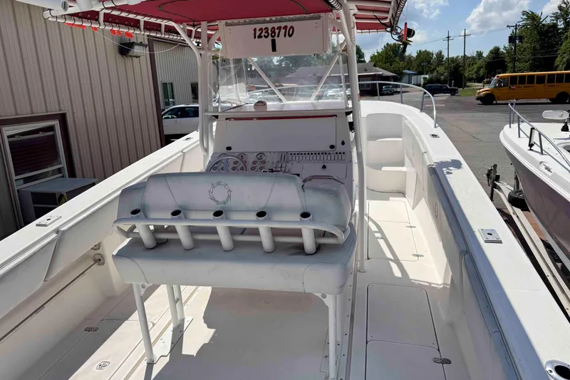 Slide: The Image of 2008 Fountain 38 Tournament Edition boat with white interior and red canopy. - 6