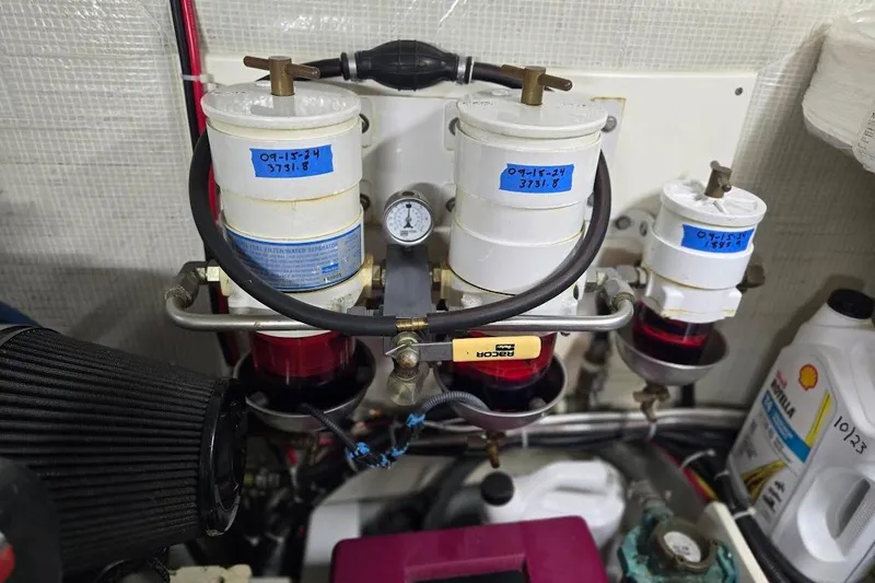 Slide: The Image of Engine room of 2005 American Tug 34 Pilothouse with fuel filters and separator system. - 106