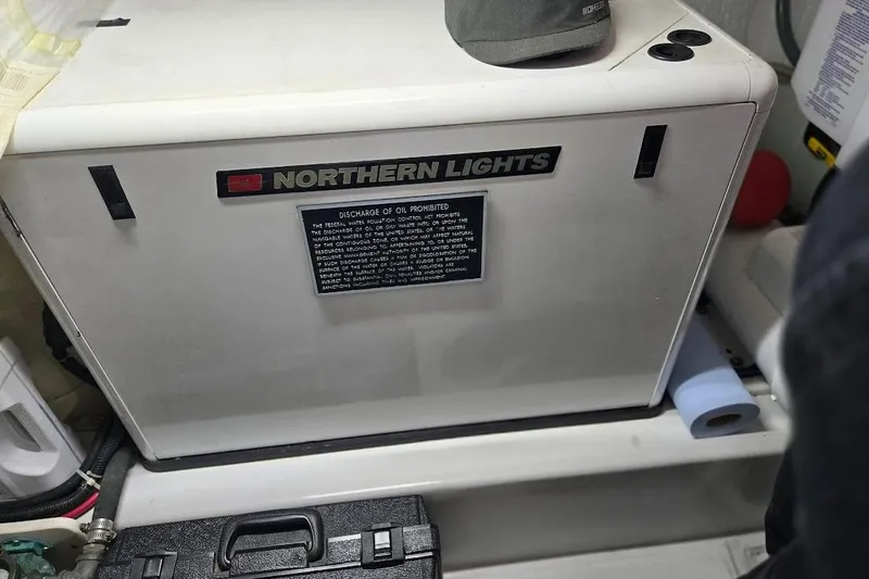 Slide: The Image of Northern Lights generator in 2005 American Tug 34 Pilothouse engine room. - 108