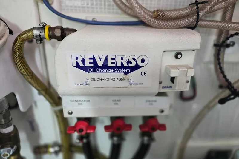 Slide: The Image of Reverso oil change system in 2005 American Tug 34 Pilothouse engine room. - 109