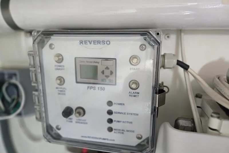 Slide: The Image of Control panel of a 2005 American Tug 34 Pilothouse, featuring Reverso FPS 150 system. - 112