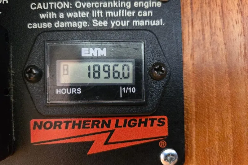 Slide: The Image of Hour meter reading 1896.0 on 2005 American Tug 34 Pilothouse engine panel. - 53