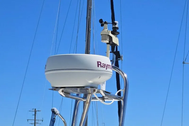 Slide: The Image of Radar equipment on 2005 American Tug 34 Pilothouse against clear blue sky. - 69