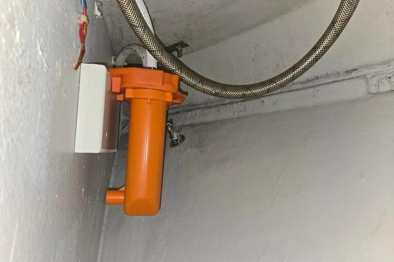 Slide: The Image of Orange filter system in 2005 American Tug 34 Pilothouse boat interior. - 74