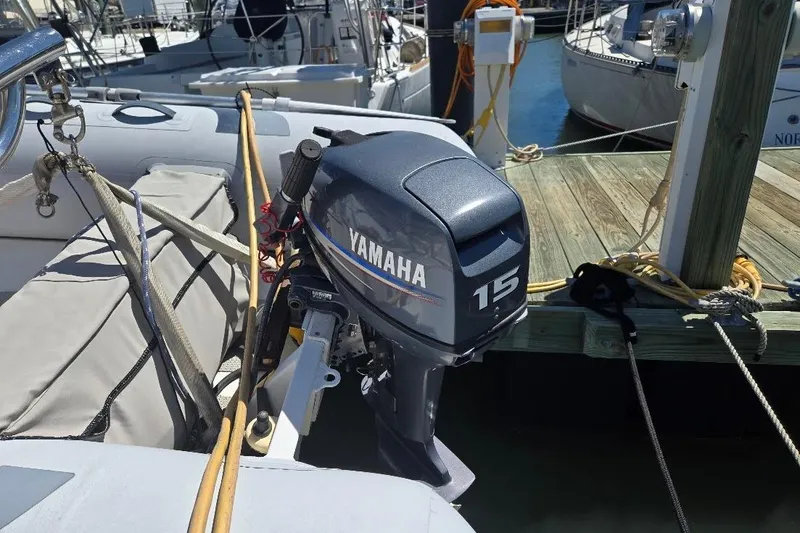 Slide: The Image of Yamaha 15 outboard motor on a 2005 American Tug 34 Pilothouse at dock. - 78