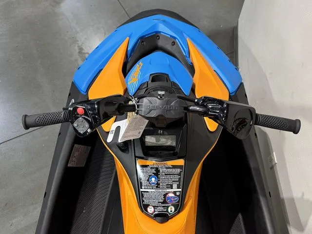 Slide: The Image of 2026 Sea-Doo Spark Trixx for 3, blue-orange, close-up of handlebars. - 22