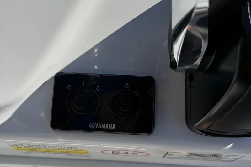 Slide: The Image of Battery switch on a 2026 Tidewater 180CC boat with open protective cover. - 13
