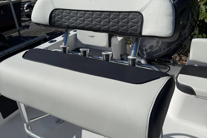 Slide: The Image of 2026 Tidewater 180CC boat storage compartment with secure latches and sleek design. - 17
