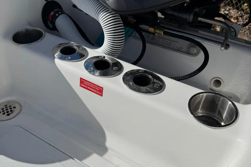 Slide: The Image of 2026 Tidewater 180CC boat interior with cleat and logo detail. - 24