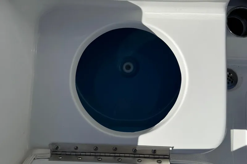 Slide: The Image of Interior detail of 2026 Tidewater 180CC boat, featuring a mounted rod holder. - 25