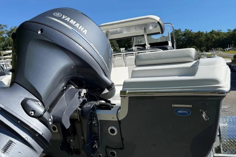 Slide: The Image of 2026 Tidewater 180CC boat console with steering wheel and controls. - 7