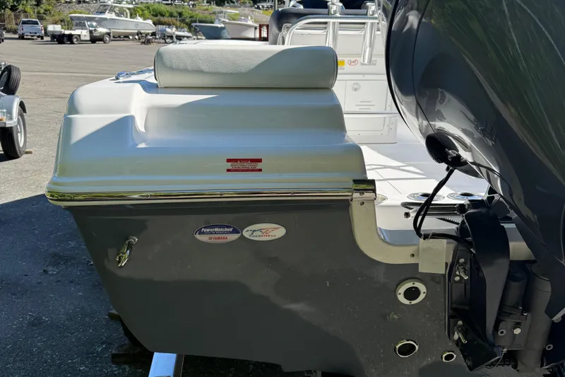 Slide: The Image of 2026 Tidewater 180CC boat interior with steering console and seating. - 8