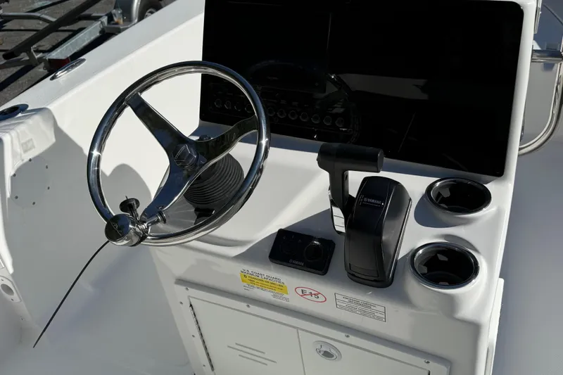 Slide: The Image of Cup holders and control panel on 2026 Tidewater 180CC boat. - 9