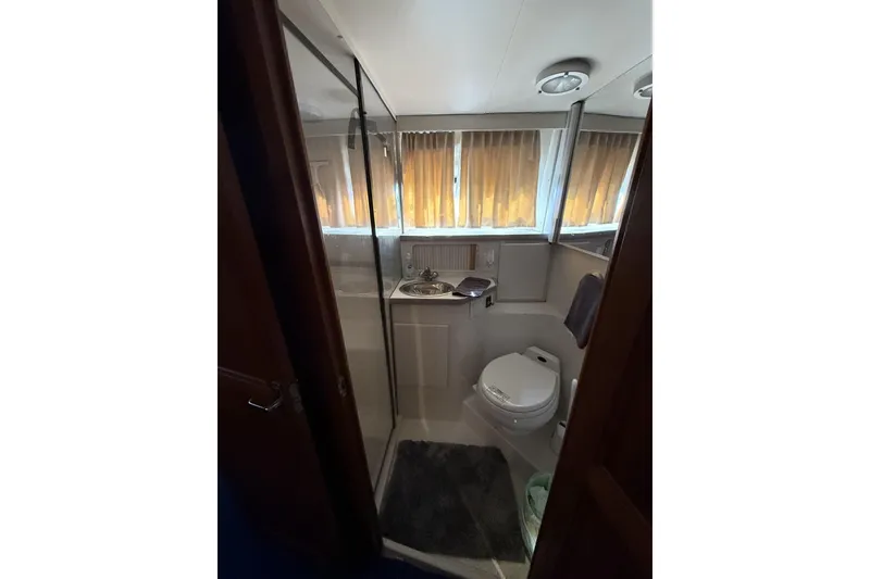 Slide: The Image of Bathroom interior of 1993 Carver 350 Motor Yacht with shower and toilet. - 18