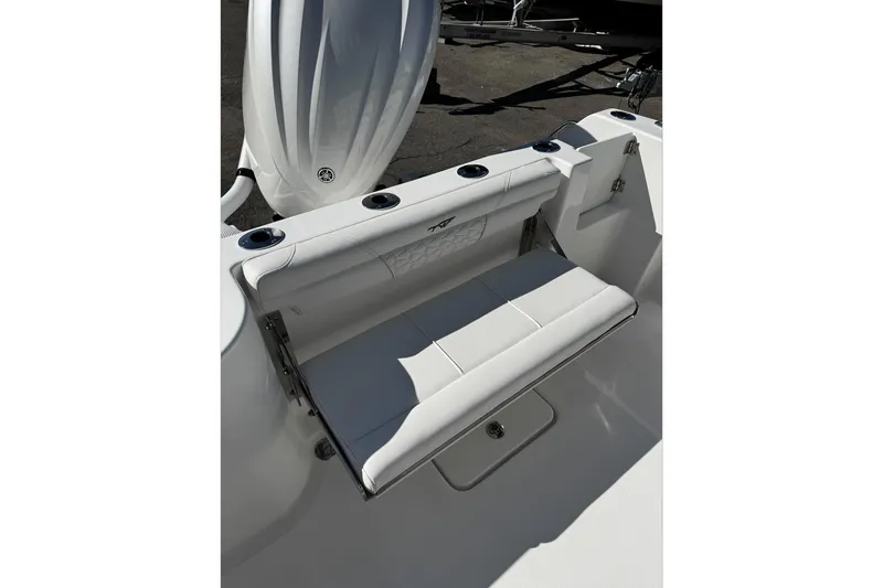 Slide: The Image of Hinged compartment on 2026 Tidewater 232 CC Adventure boat, featuring a sleek design. - 19