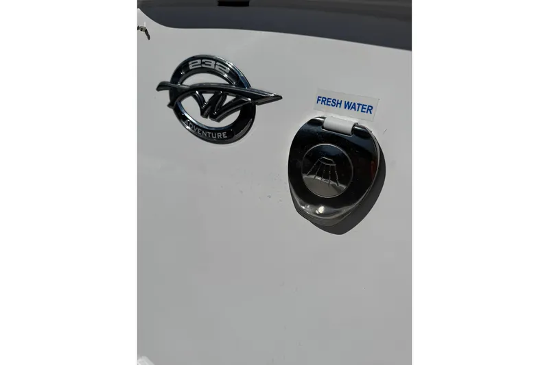 Slide: The Image of Tidewater 232 CC Adventure 2026 boat with fresh water access port. - 21