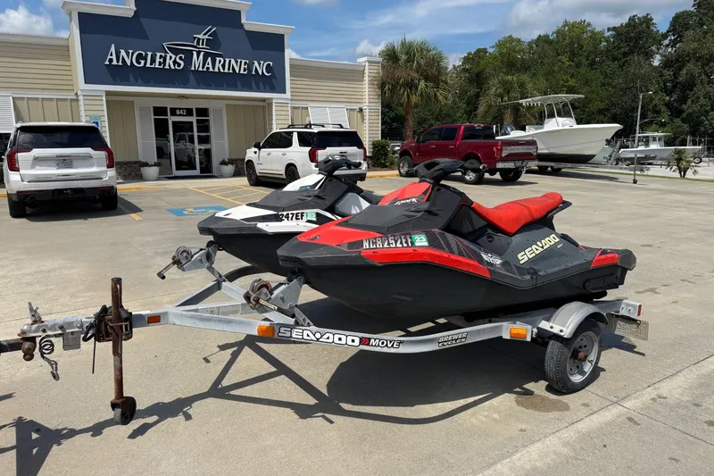 The Image of 2017 Sea-Doo Spark 2up jet skis on trailer at Anglers Marine NC dealership. - 0