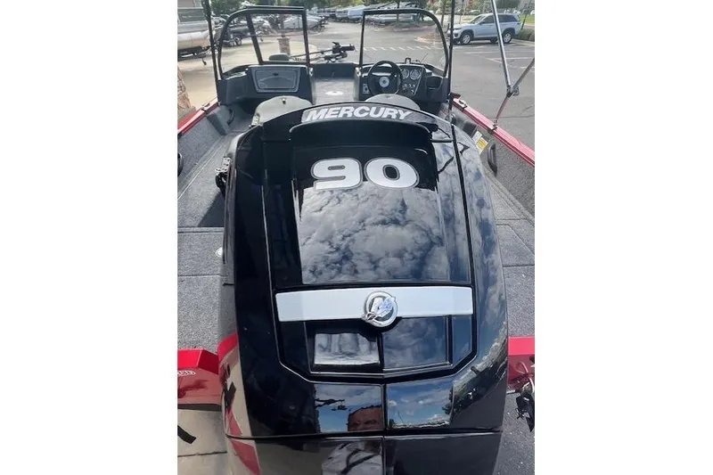Slide: The Image of 2026 Tracker Pro Guide V-16 WT with Mercury 90 engine, parked on trailer. - 4