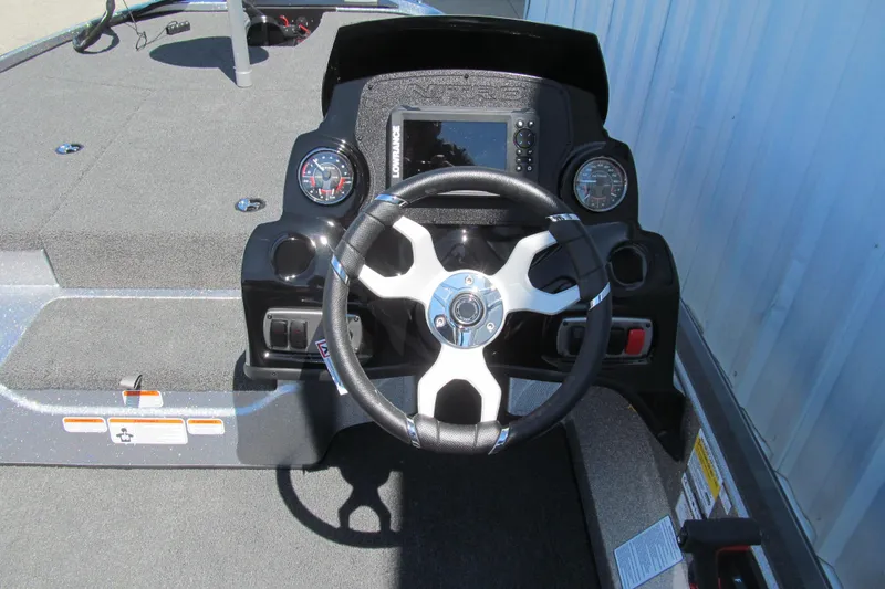 Slide: The Image of 2026 Nitro Z17 boat dashboard with steering wheel and gauges. - 5