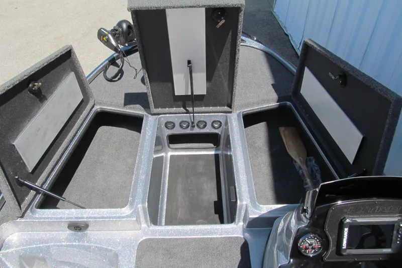 Slide: The Image of 2026 Nitro Z17 boat storage compartments with open lids, showcasing interior space. - 7