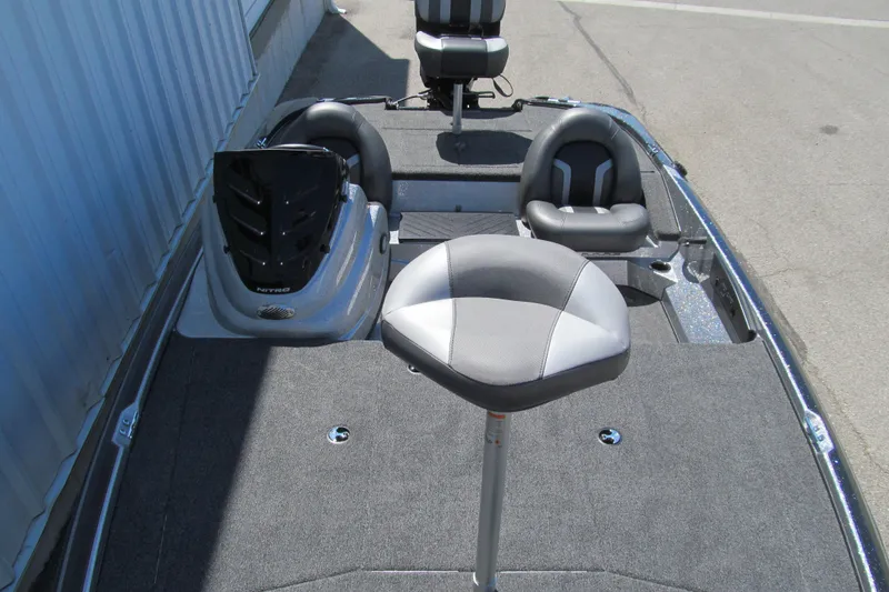 Slide: The Image of 2026 Nitro Z17 boat interior with seating and steering console. - 9