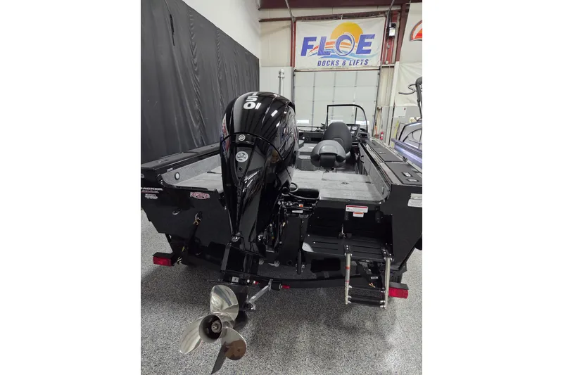 Slide: The Image of 2026 Tracker Targa V-18 Combo boat interior with storage compartments and seating. - 10