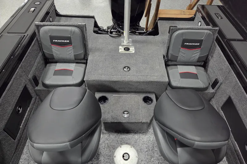 Slide: The Image of 2026 Tracker Targa V-18 Combo boat interior with modern dashboard and seating. - 8