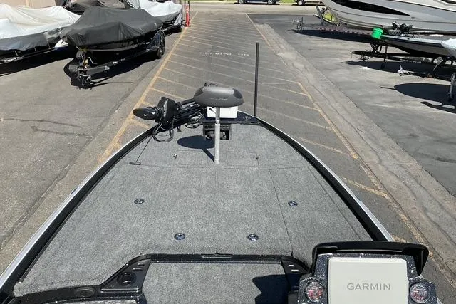 Slide: The Image of 2026 Nitro Z21 XL Pro boat with Garmin system, parked in a marina. - 13