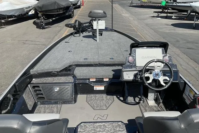 Slide: The Image of 2026 Nitro Z21 XL Pro boat interior with Garmin navigation system and steering wheel. - 17