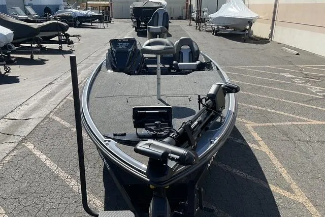 Slide: The Image of 2026 Nitro Z21 XL Pro boat in a parking lot, showcasing sleek design and advanced features. - 7