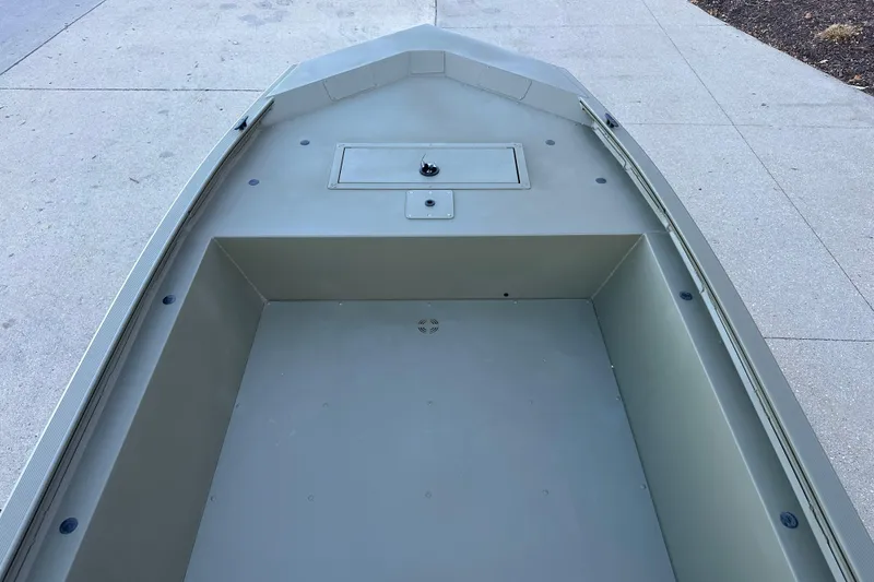 Slide: The Image of 2026 Tracker Grizzly 1648 Utility boat interior, showcasing spacious and durable design. - 3