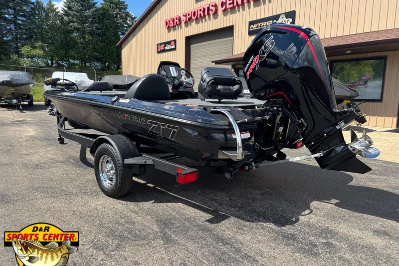 Slide: The Image of 2026 Nitro Z17 boat at D&R Sports Center, featuring powerful outboard motor. - 3