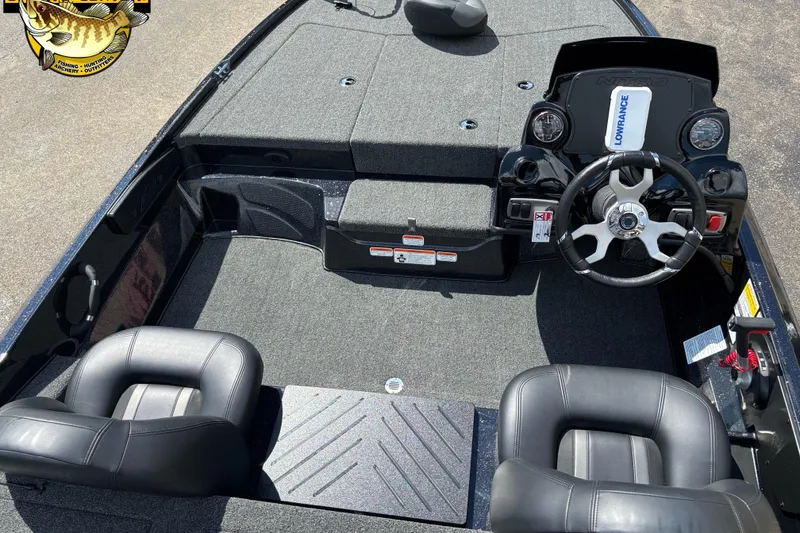 Slide: The Image of 2026 Nitro Z17 boat interior with steering wheel and seating, featuring Lowrance electronics. - 5