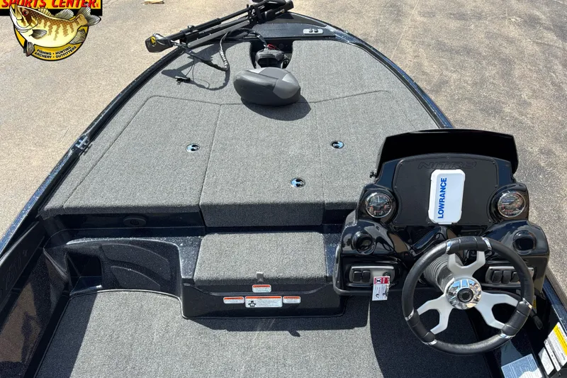 Slide: The Image of 2026 Nitro Z17 boat interior with steering wheel and Lowrance system. - 6