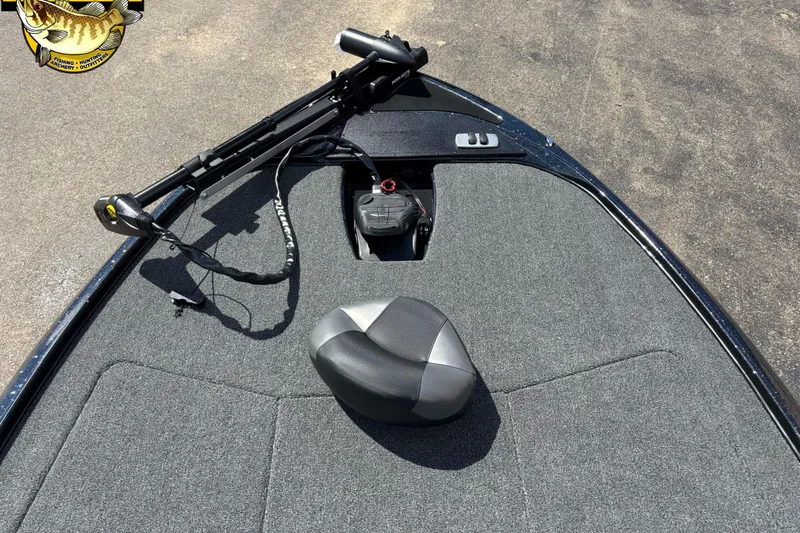 Slide: The Image of 2026 Nitro Z17 boat deck with trolling motor and cushioned seat. - 7