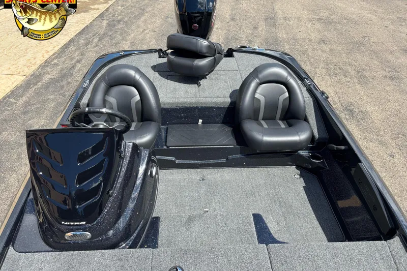 Slide: The Image of 2026 Nitro Z17 boat interior with sleek black seats and modern dashboard design. - 8