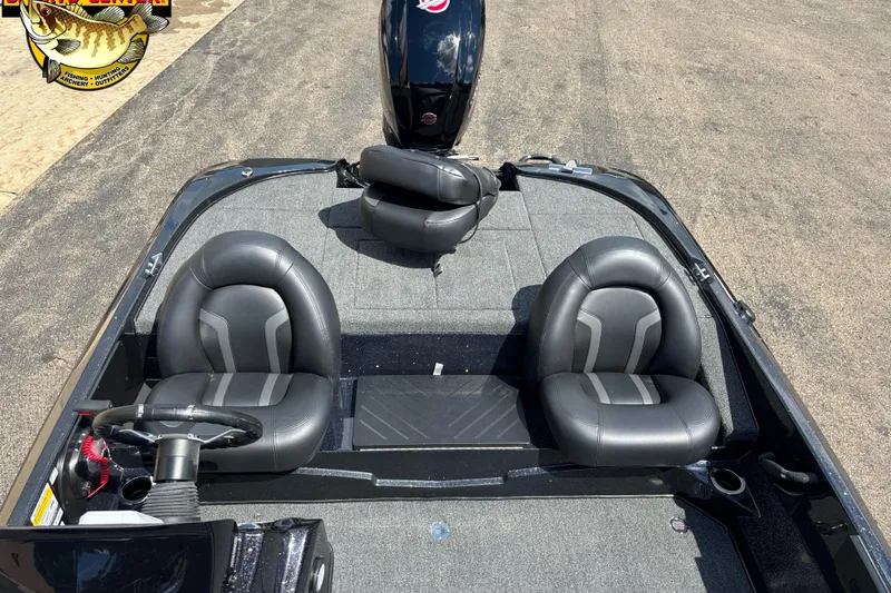 Slide: The Image of 2026 Nitro Z17 boat interior with black leather seats and steering wheel. - 9