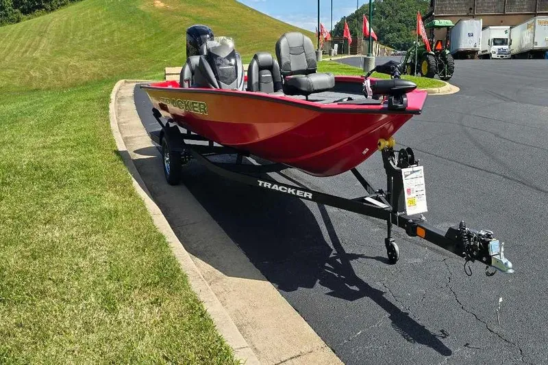 Slide: The Image of 2026 Tracker Pro Team 190 boat on trailer in parking lot. - 4
