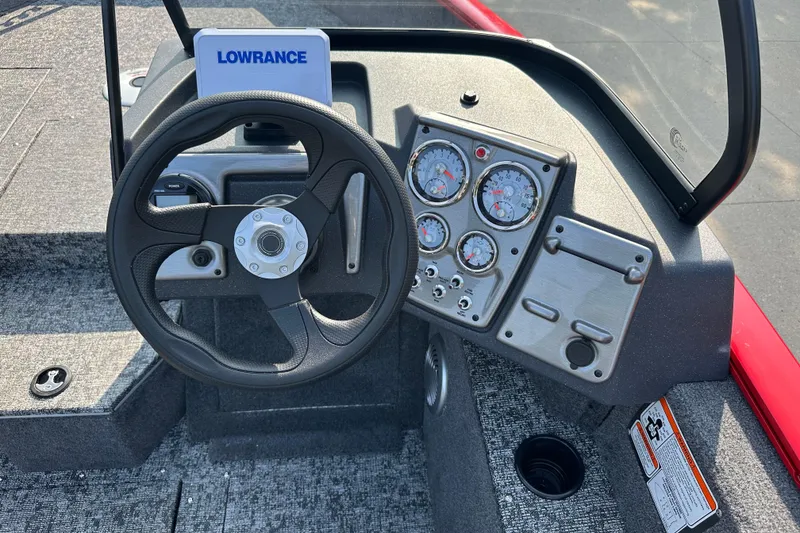 Slide: The Image of 2026 Tracker Pro Guide V-175 WT dashboard with steering wheel and gauges. - 6